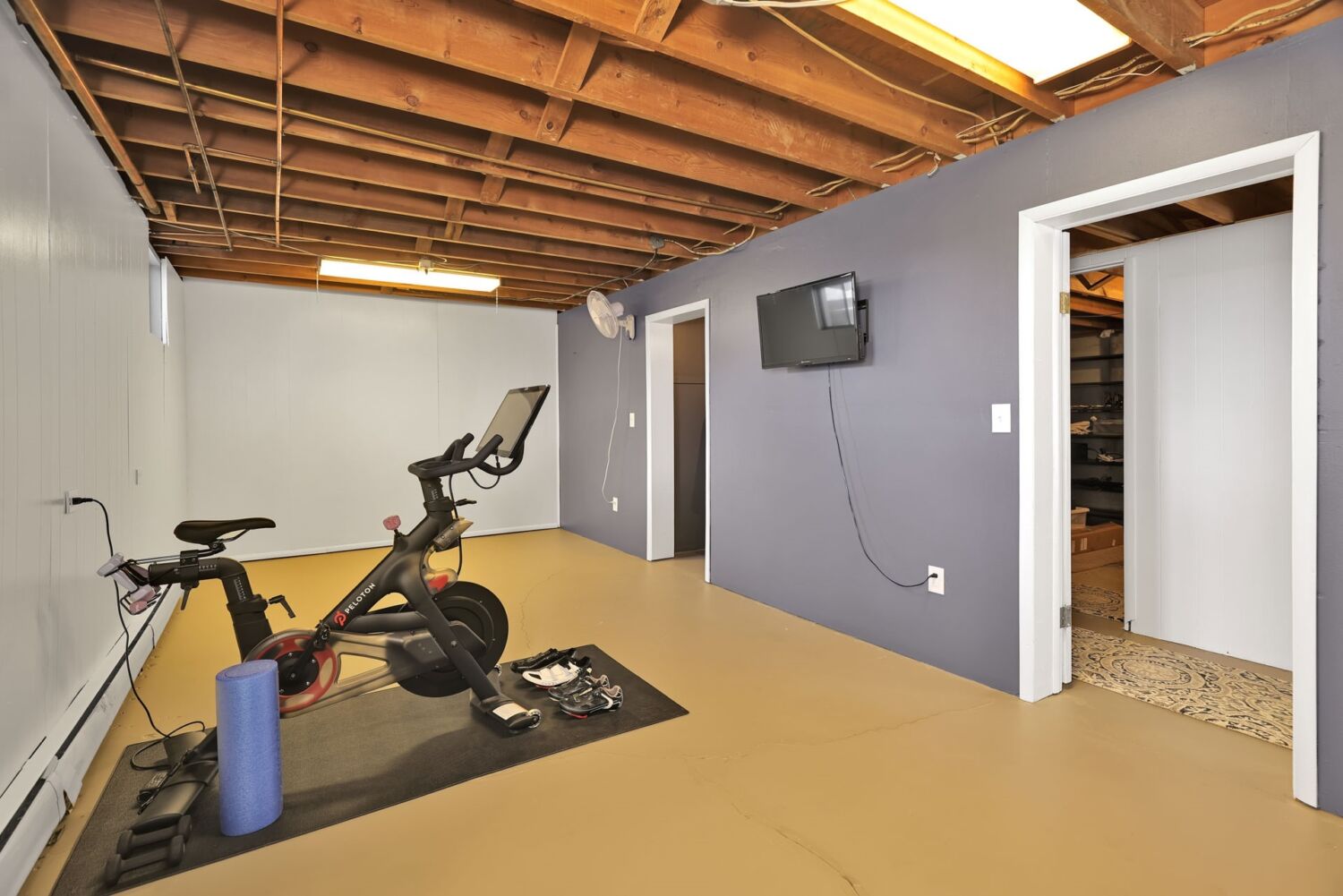 whole-house-remodel-basement-workout-room-before