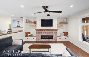 house-remodel-fort-collins-brick-fireplace-built-in-benches-drawers-floating-shelves
