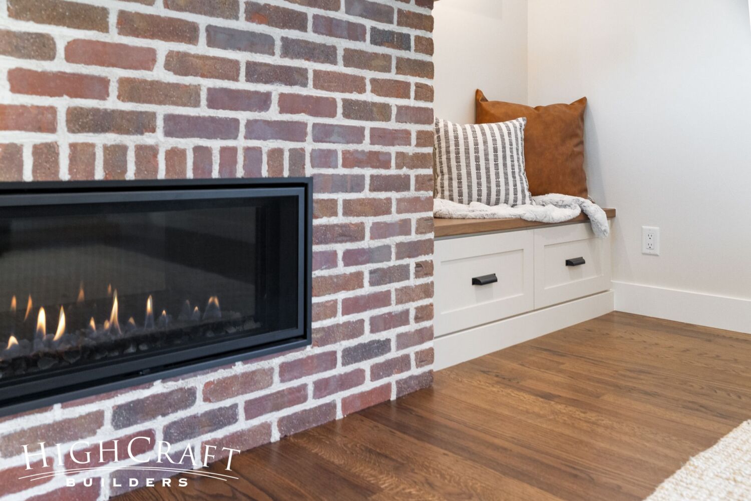 house-remodel-fort-collins-brick-fireplace-built-in-benches-drawers