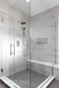 bathroom-remodel-fort-collins-frameless-glass-shower-gray-tile-bench
