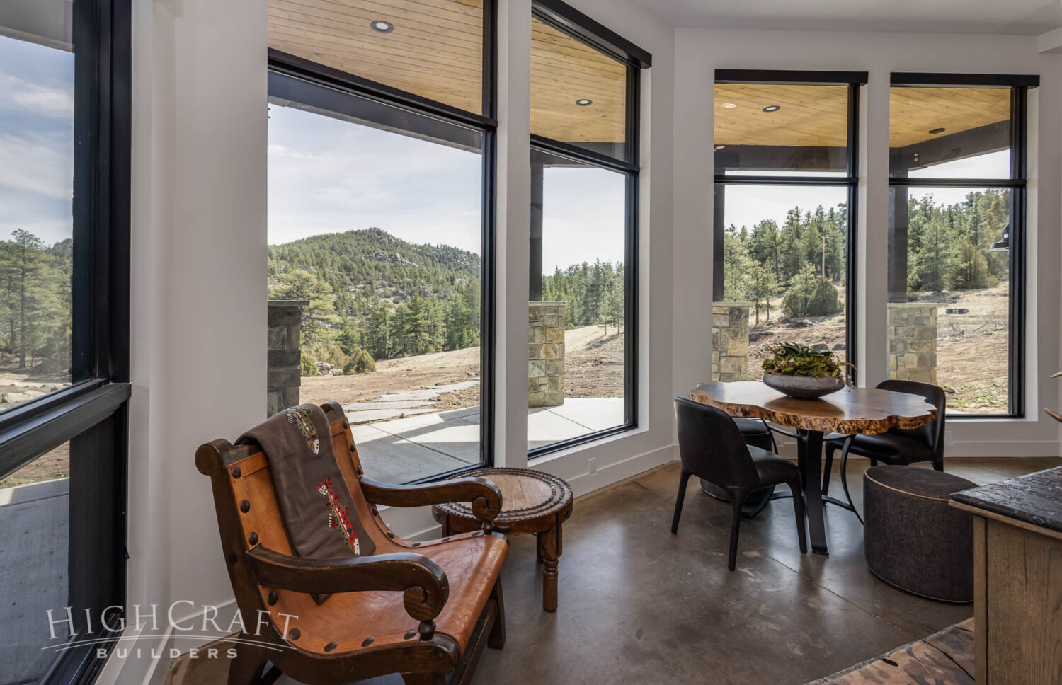 custom-home-builder-red-feather-lakes-co-basement-rec-room-seating-area-windows