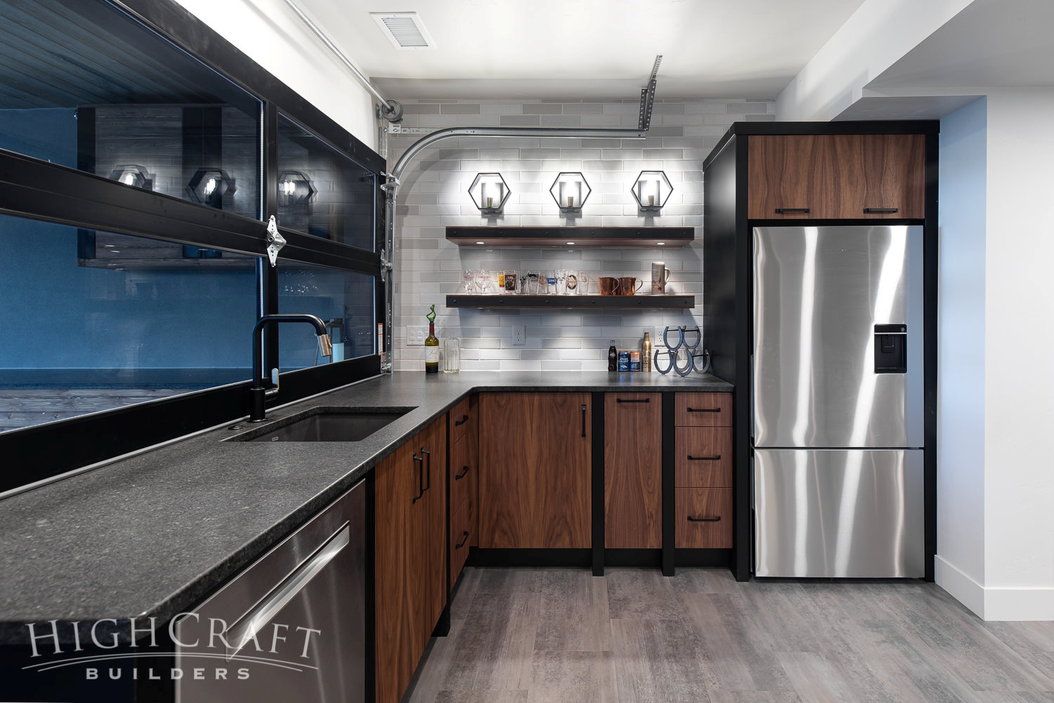 loveland-lake-home-builder-basement-wet-bar-garage-doors