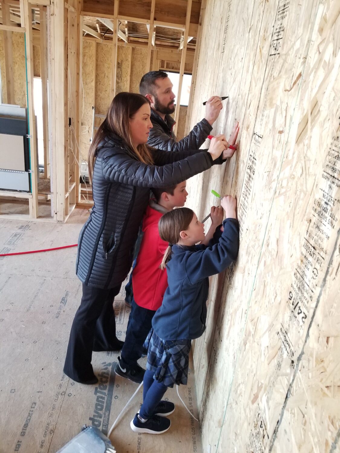 loveland-home-builder-clients-writing-on-walls