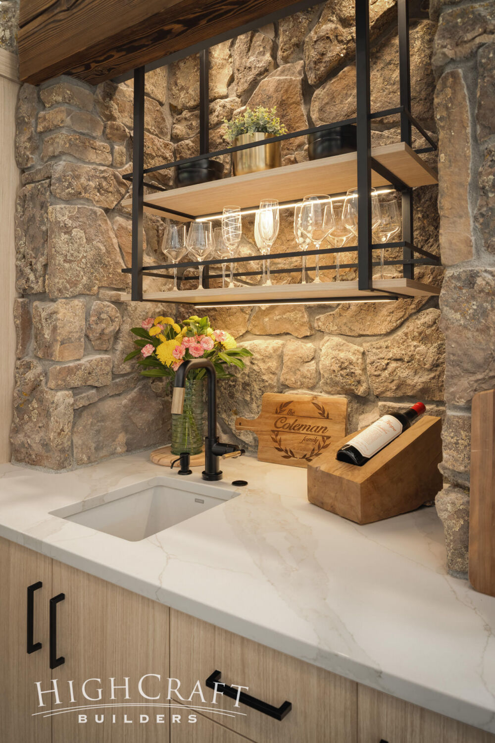 red-feather-lakes-kitchen-remodel-stone-wall-prep-area-wine-storage