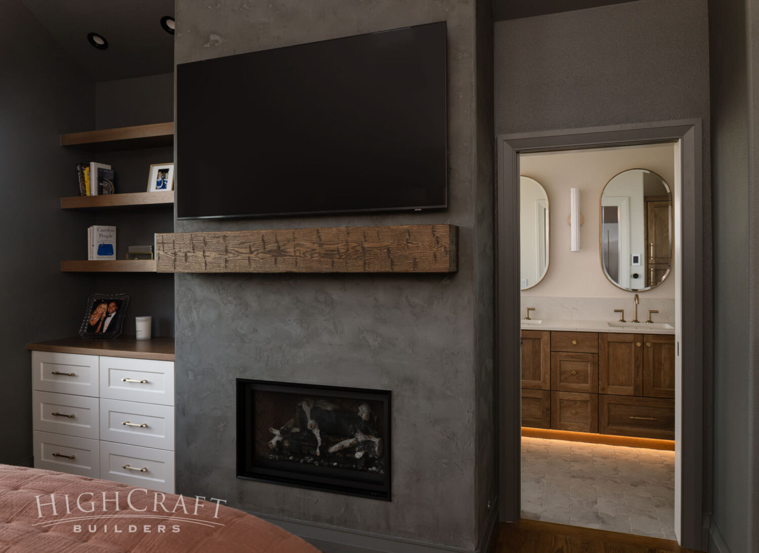 home-remodeling-cheyenne-wyoming-primary-bedroom-fireplace-venetian-plaster-bathroom-view
