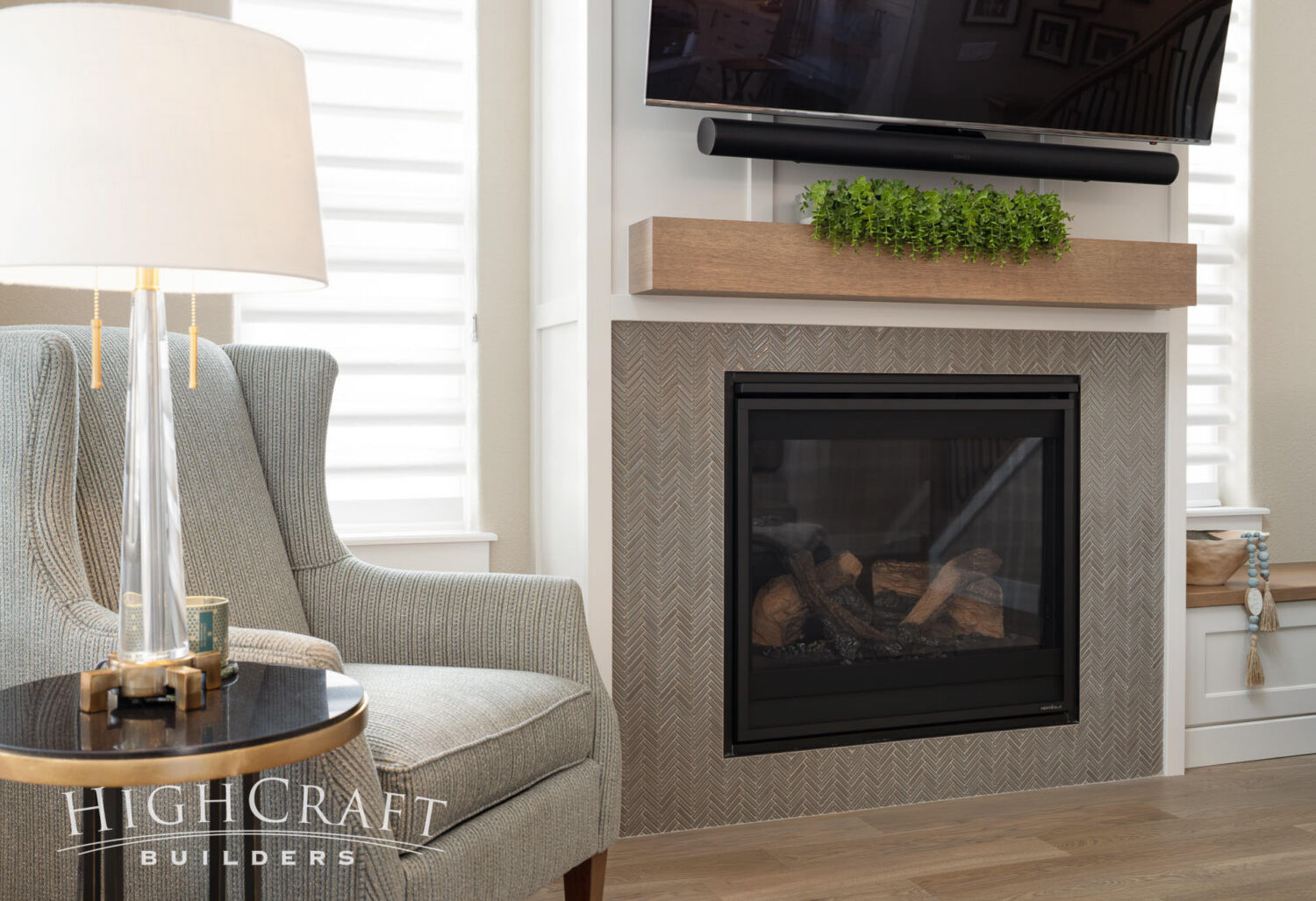 senior-living-patio-home-remodel-herringbone-tile-fireplace